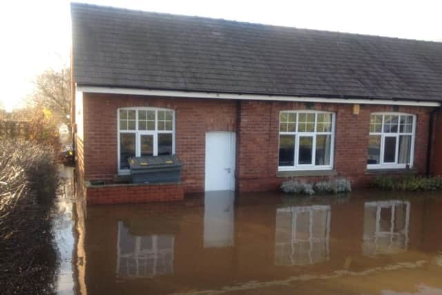 St Michaels School during and after the floods