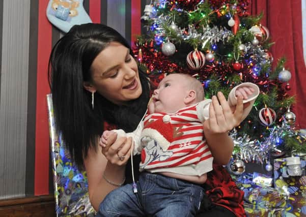 Kerrylee Glass with 5-month-old son Thomas Williams who is back home for Christmas after spending most of his life in hospital