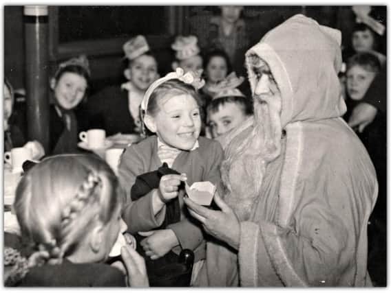 Santa Claus at a Christmas Party, in London Road Labour Club, in Preston, in 1946