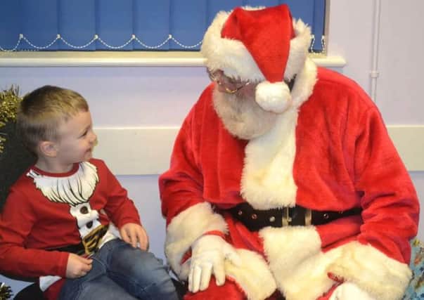 Oliver Barnes meets Santa at the Lil Grangers Christmas Party 2016