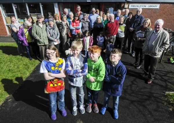 Protest over the potential closure of Freckleton Library.  Youngsters Evie Knowles, 11, Sean Rhodes, 10, Steven Rhodes, 11 and Kelby Knowles, 8, with other protesters behind.