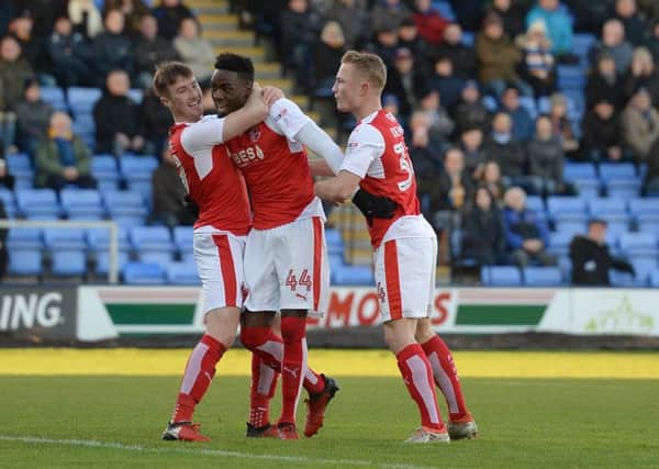Fleetwood Town's Devante Cole celebrates scoring his sides first goal at Shrewsbury with team-mates Kyle Dempsey and Chris Long.