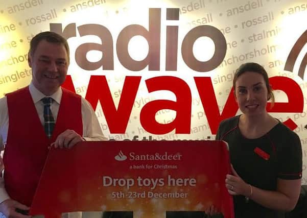 Andy Mitchell, Presenter at Radio Wave & Clare Jordan, Branch Manager at Santander in Fleetwood.