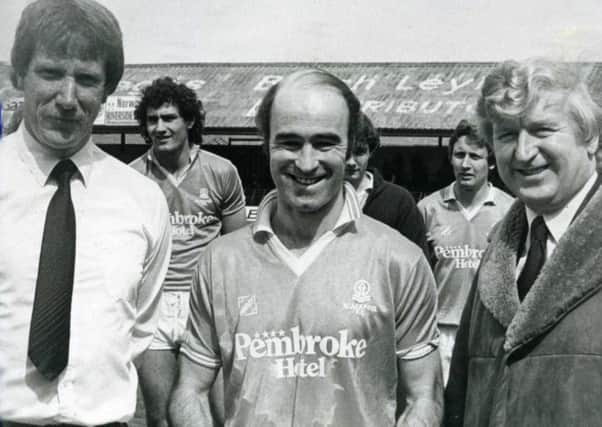 Peter Noble on his last day as a Blackpool player, flanked by manager Sam Ellis and chairman Ken Chadwick