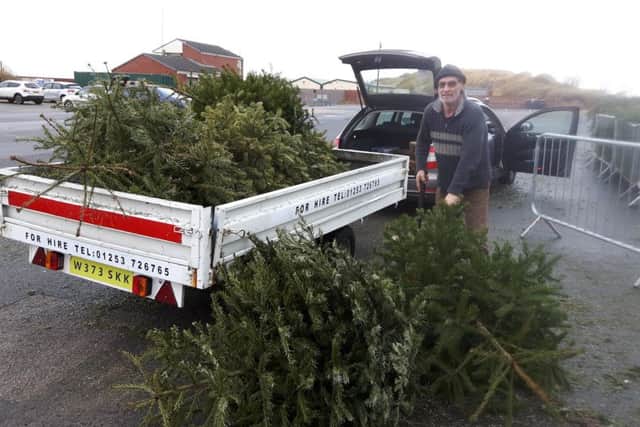 St Annes In Bloom volunteer Rick Armstrong -Bell collects Christmas trees for recycling