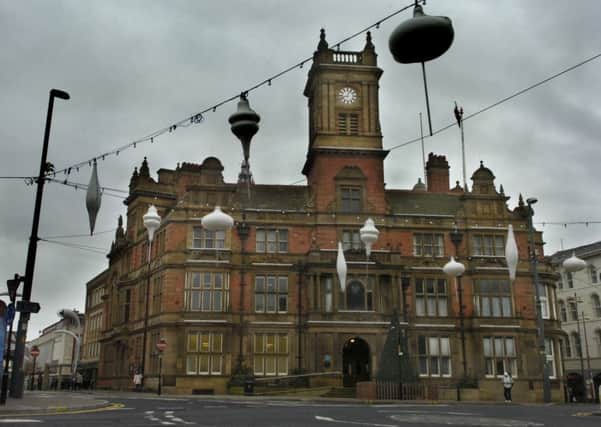 Blackpool Council has written off Â£600k of debt.  Pictured is Blackpool Town Hall.