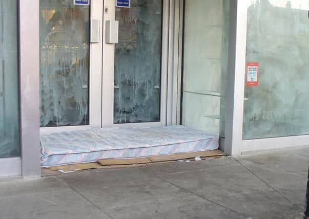A mattress in the  former JR Taylor shop doorway
