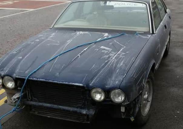 This Jaguar was stopped by police as it was driven down Talbot Road