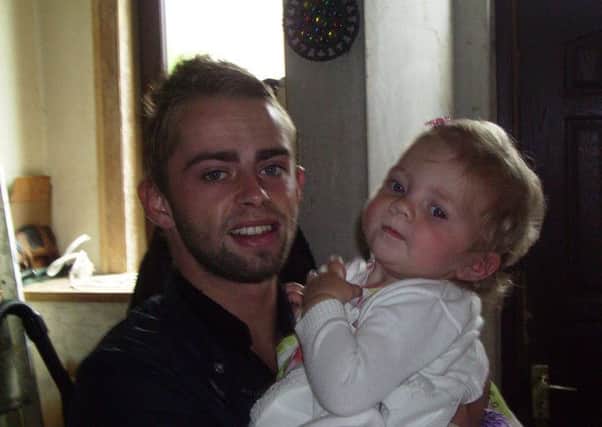 Ashley Herrington with his niece Lily