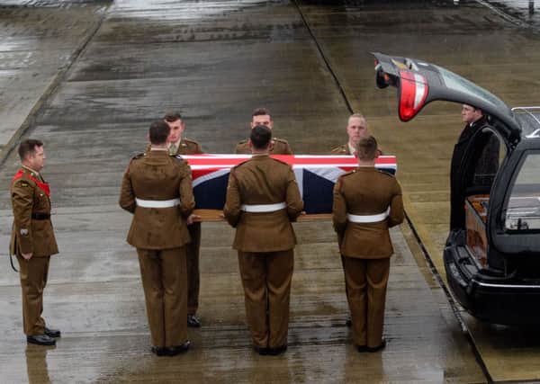 L/Cpl Scott Hetherington's body is returned to the UK. Picture: PA