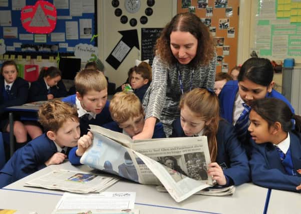 Photo Neil Cross	
Suzanne Warr, deputy production editor with The Guardian, visiting St Mary's RC Primary School, London Street Fleetwood, as part of a national scheme, with Ethan Thom, Oliver Mallon, Shaun Hughes, Mellissa Ranasinghe, Georgia Higson and Lamiha Mashrufa