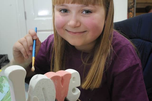 The Glazey Days ceramic party studio has opened its new premises next to the North Euston Hotel in Fleetwood.
Micha Gaynor (8) painting her 3D word.