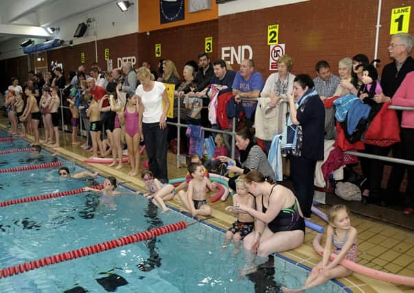 Parents and supporters cheer on the teams at a previous Lytham St Annes Lions swimarathon