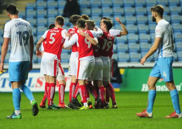 Fleetwood celebrate scoring at Coventry