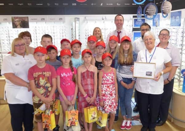 Children from Chernobyl at the opticians at Tesco in Blackpool