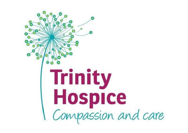 New Trinity Hospice logo.