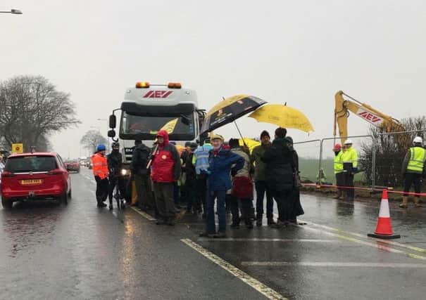 Protesters slow-walk a lorry onto Cuadrillas shale gas exploraton site off Preston New Road