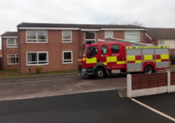 Firefighters outside Cairn Court