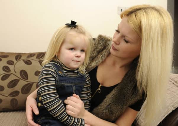 Hayley Lines with three-year-old daughter Lilly, who was struck by a hit and run driver