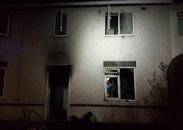 A man was dramatically rescued from the bedroom of his burning home