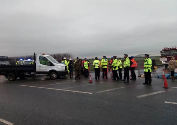 Anti-fracking protesters stop a truck at Preston New Road