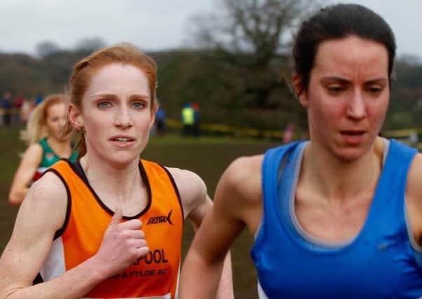 Emily Japp keeps pace with Leeds City ACs Georgia Malir