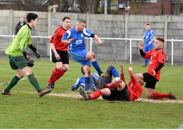 Andrew Richards can't find a way through for Gate in a goalmouth scramble  Picture: ALBERT COOPER