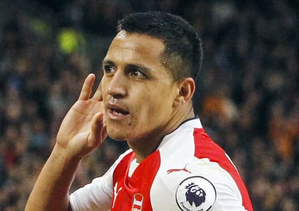 Arsenal's Alexis Sanchez has been linked with a move to Paris St Germain