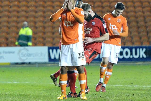 Danns reacts to his penalty miss
