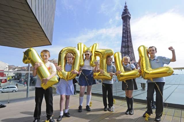 Blackpool youngsters celebrate after securing Â£10m of Lottery funding for the town's Headstart programme.  L-R are Jonathan Hillier, Bethany Whipp, Courtney Ward, James Hussey, Courtney Staff and Sam Steele.