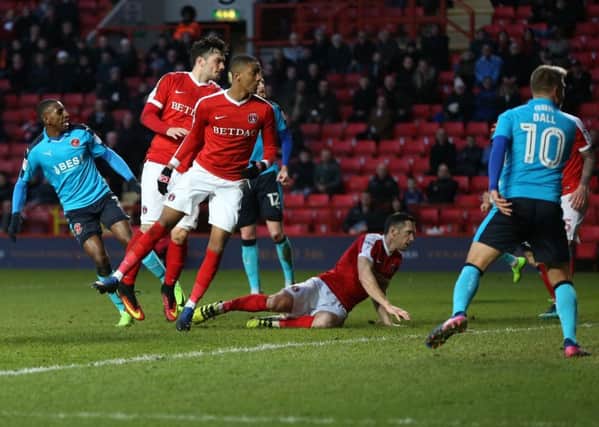 Fleetwood Town's Amari'i Bell scores his sides first goal