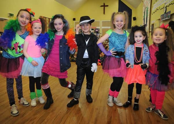 Pupils at St Nicholas' School in Marton finished their week of 20th century history and geography by dressing in outfits from various decades during these 100 years.
The Day-Glo 80s.  PIC BY ROB LOCK
10-2-2017