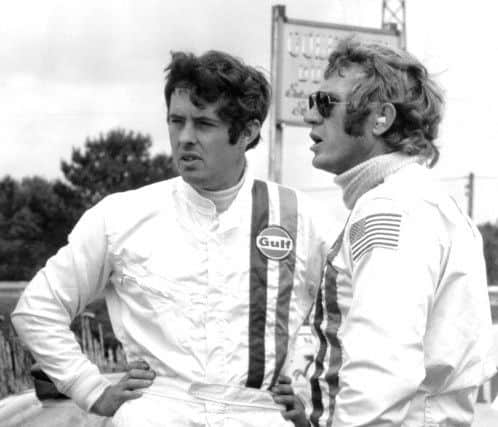 Ex-Rossall School pupil and racing driver  Brian Redman (left) with Hollywood legend Steve McQueen.