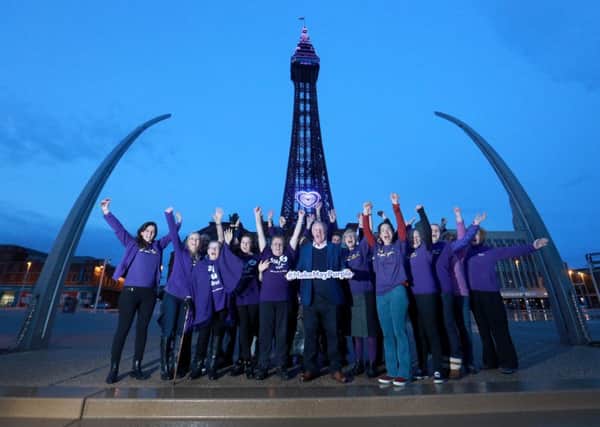 Les Dennis and Stroke Association staff and survivors celebrating Make May Purple last year