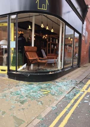 Smashed corner window at The Attik shop, St Annes