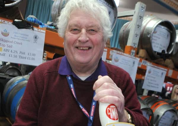 The Fleetwood Beer Festival opened its doors at the Marine Hall this afternoon.
Membership Secretary Ray Jackson pulls a pint of new local brewery Skippool Creek's popular beer Top Sail.  PIC BY ROB LOCK
10-2-2017