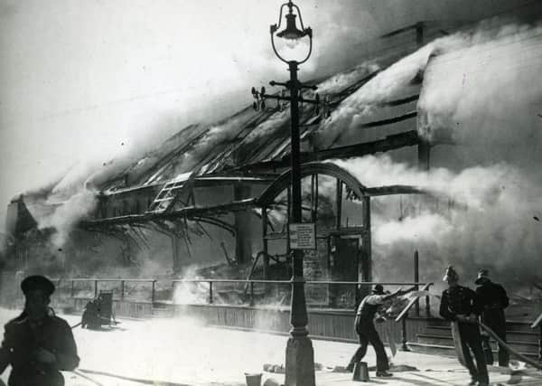Fire at North Pier Blackpool  19/06/1938.
Firemen tackle the blaze
historical
Published 20/06/38