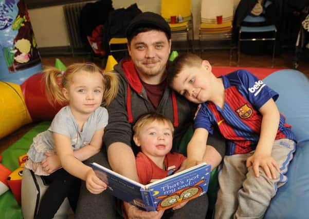 Gary Cumber with children Elliah, 3, Kyril, 2 and Harvee, 5.