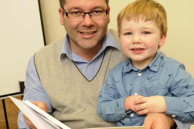 Daniel Cooke with son George, aged two and a half