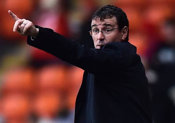 Blackpool boss Gary Bowyer tries to point the way ahead for his players during the draw against Crewe Alexandra