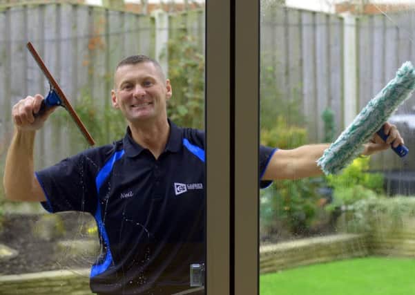 010416  Window cleaner Neil Caden from Garforth, Leeds , getting in some practise  before his speed window cleaning world record attempt in Manchester next week. (Gl1009/50e)