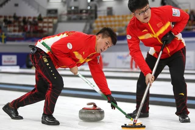 An action shot by Uclan student Tom Rowland at the VoIP Defender World Junior Curling Championships 2017 in South Korea credit: WCF/ Tom Rowland