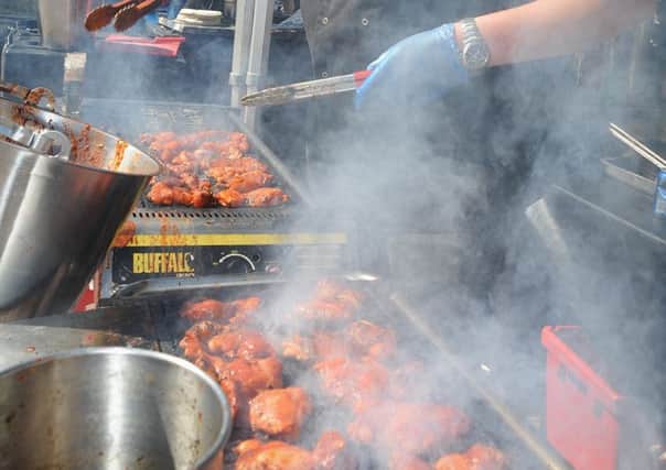 Blackpool held its annual Chilli Festival in St Johns Square. Hot work for Alistair Bain preparing food for the Chew Chew BBQ