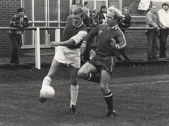 Fleetwood Town v Rossendale, in 1981. Determined striker Carl Howarth gets in his centre before the Rossendale tackle comes in