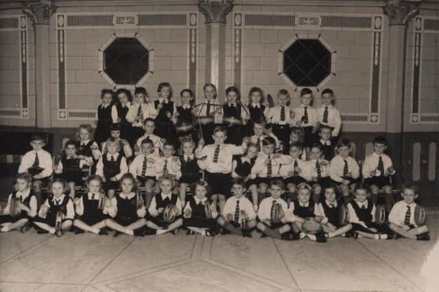 Leslie Heyes, aged six, is on the middle row, right, with the Hawes Side School Percussion Band, winners of their class in the Blackpool Musical Festival at the Winter Gardens in November 1947
