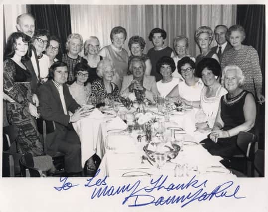 Leslie Heyes and his staff, pictured in 1973 at a party thrown by the Opera House summer season star Danny La Rue (centre) 
Les is at the table on the left