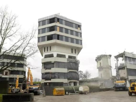 The eight-storey tower was demolished at around 9am