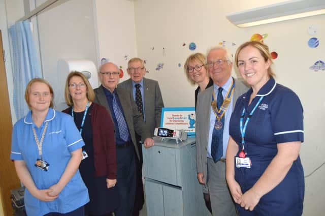 [L-R] Staff nurse Donna Leedham, ward manager Isabel Spencer, Lytham Rotary Club photographer Raymond Thomas, membership and publicity chairman Roger Ducat, Evelyn Glarvey from MedEquip4Kids; Rotary Club president Peter Langley, and ward sister Louise Paramel