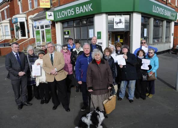 Residents and councillors are protesting over the closure of Lloyds Bank on Whitegate Drive
