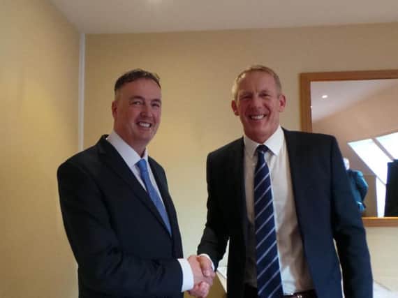 Clive Grunshaw congratulated Andy Rhodes on his appointment